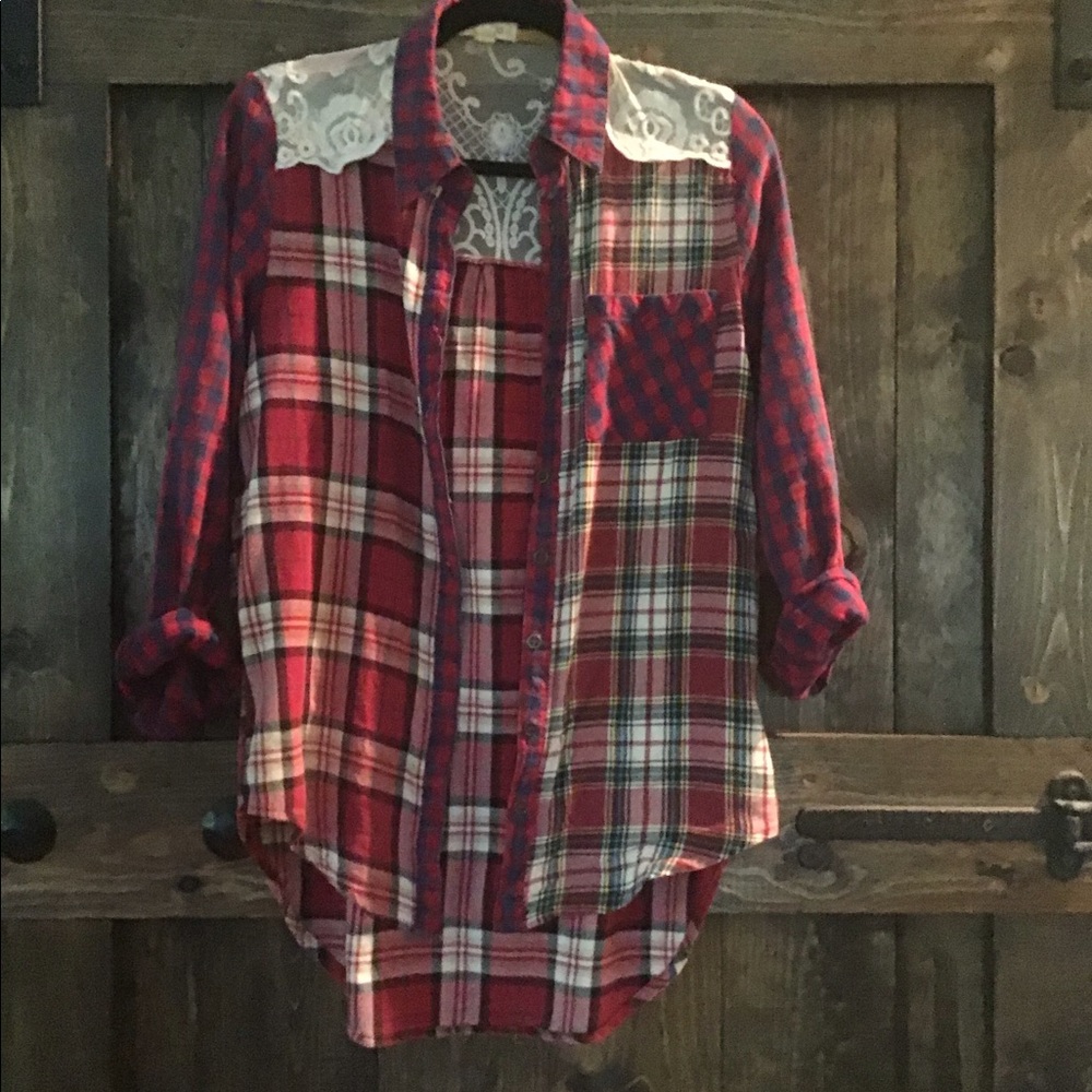 Thin plaid top with lace detail.